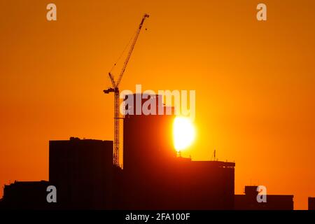 Sunrise behind Leeds City Centre skyline.Yorkshire's tallest building 'Altus House' is currently under construction Stock Photo