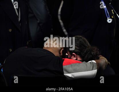 Minneapolis, United States. 21st Apr, 2021. Family members are comforted during a public viewing for 20-year-old Daunte Wright in Brooklyn Center, Minnesota on Wednesday, April 21, 2021. Wright was shot and killed by police officer Kimberly Ann Potter, who thought she was using a taser gun, during a recent traffic stop and attempted arrest. Photo by Jemal Countess/UPI Credit: UPI/Alamy Live News Stock Photo