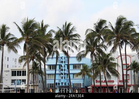 Ocean Drive Hotel buildings. Art deco area. Famous Colony Hotel and Boulevard Hotel. Also, a CVS on ocean drive is spotted. Stock Photo