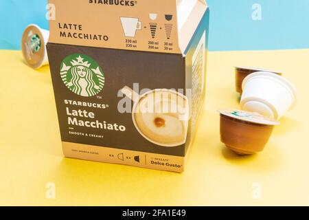 Tyumen, Russia-December 10, 2020: Starbucks latte Macchiato coffee capsules.  selective focus logo Stock Photo - Alamy