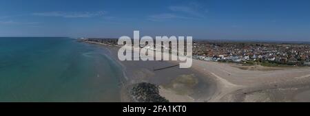 Beautiful Aerial Panoramic View along the sweeping beach of Middleton On Sea towards Bognor Regis in West Sussex, a popular destination for tourists. Stock Photo