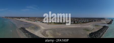 Aerial Panoramic Photo along the sweeping beach of Middleton On Sea towards Bognor Regis in West Sussex, a popular destination for tourists. Stock Photo