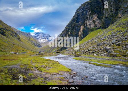 Landscape with a river. Hiking in the mountain of Himalaya, Parvati valley on a trek to Hamta Pass, 4270 meters above sea level, on the Pir Panjal ran Stock Photo