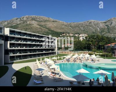 Dubrovnik, Croatia - May 18 2015: Exterior view of the Sheraton Dubrovnik Hotel and its swimming pool Stock Photo