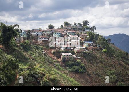 A small picturesque hillside village while hiking from Kalaw to Inle Lake, Shan state, Myanmar Stock Photo