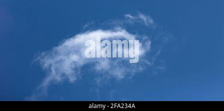 White cloud on a blue sky background. Stock Photo