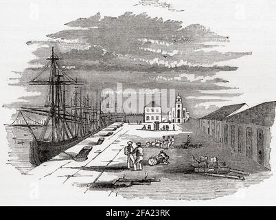 The East India Import Dock, Blackwall, London, England, seen here in the early 19th century. The Import dock was built to provide room to unload the East Indiamen returning from their voyages.  From The History of Progress in Great Britain, published 1866. Stock Photo