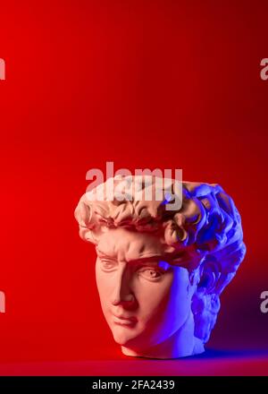 Gypsum statue of David's head. Michelangelo's David statue plaster copy. Stock Photo