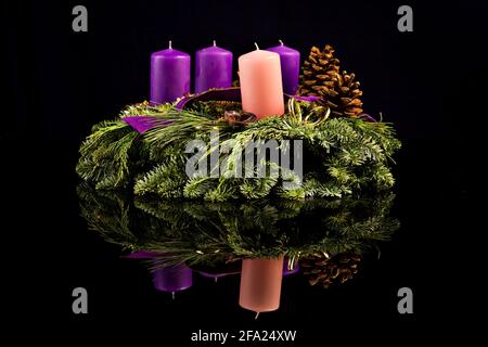 advent wreath against black background Stock Photo
