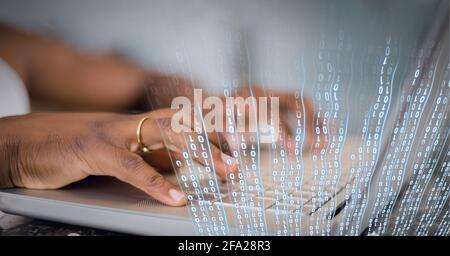Composition of binary data processing over man typing on laptop keyboard Stock Photo