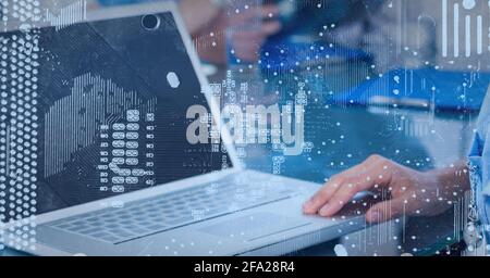 Composition of statistics with digital icons over man typing on laptop keyboard Stock Photo