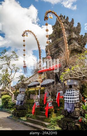 Hindu temple (pura) in Penglipuran, traditional village. Bangli Regency, Bali, Indonesia. Vertical image. Stock Photo