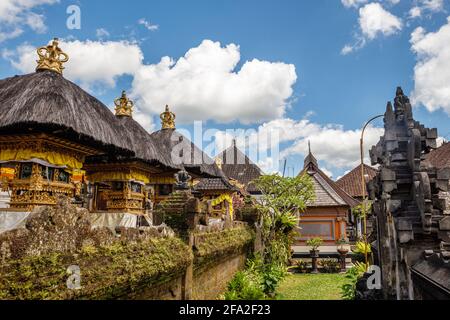 Streets of Desa Penglipuran, traditional village in Bangli Regency, Bali, Indonesia. Traditional Balinese houses with family altars. Stock Photo