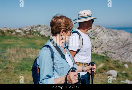 Senior couple practicing trekking outdoors Stock Photo