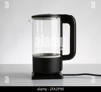 Empty electric glass kettle isolated on white background Stock Photo