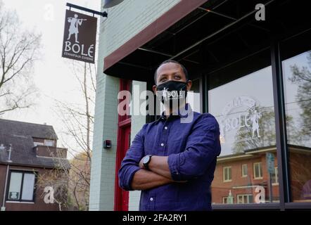 Minneapolis, United States. 22nd Apr, 2021. Solomon Hailie, owner of 'Bole' Ethiopian Restaurant, poses in front of his restaurant in Minneapolis, Minnesota, on Tuesday, April 20, 2021. The restaurant was destroyed in the riots following the death of George Floyd in 2020, and the community raised over $100,000 to help with rebuilding. 'I wanted to create a safe place for everybody of all races, all human beings and I believe Ethiopian food helps to create such a place', said Hailie. Photo by Jemal Countess/UPI Credit: UPI/Alamy Live News Stock Photo