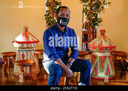 Minneapolis, United States. 22nd Apr, 2021. Solomon Hailie, owner of 'Bole' Ethiopian Restaurant, poses inside his restaurant in Minneapolis, Minnesota, on Tuesday, April 20, 2021. The restaurant was destroyed in the riots following the death of George Floyd in 2020, and the community raised over $100,000 to help with rebuilding. 'I wanted to create a safe place for everybody of all races, all human beings and I believe Ethiopian food helps to create such a place', said Hailie. Photo by Jemal Countess/UPI Credit: UPI/Alamy Live News Stock Photo
