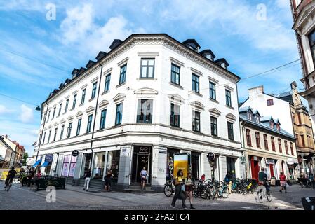 Lund, Sweden - August 30, 2019: Shopping street with restaurants, shops and people around in Lund, Scania, Sweden Stock Photo