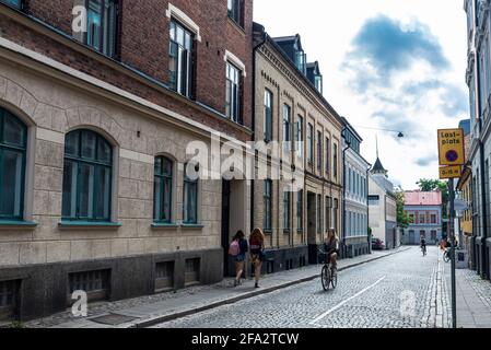 Lund, Sweden - August 30, 2019: Street with people on bicycle in Lund, Scania, Sweden Stock Photo