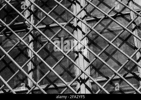 metal grates on the windows. black white photo. High quality photo Stock Photo