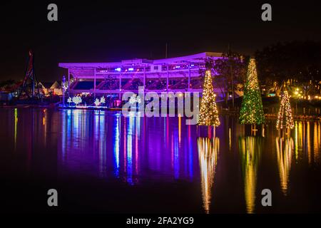 Orlando, Florida. November 20, 2020. Christmas trees reflecting in lake at Seworld (24 Stock Photo
