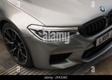 A 2019 Donington Grey BMW M5 Competition Pack With With Gloss Black Trim And Gloss Black M Badges And BMW Adaptive LED Headlights Stock Photo