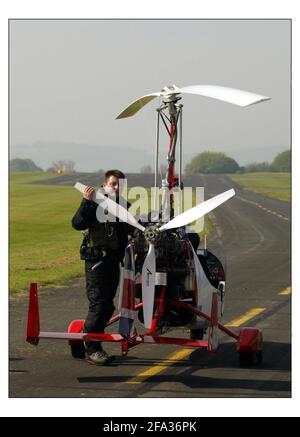 Expedition Global Eagle, led by Army Warrant Officer Barry Jones is the first ever attempt to fly around the world in an autogyro - the light aircraft made famous in 1967 as Sean Connery's gadget little Nellie in the James Bond film 'You only live twice'. The attempt began today. 21 April 2004  departing from Middle Wallop in Hampshire and taking in 25 different countrys take three and a half months.pic David Sandison 26/4/2004 Stock Photo