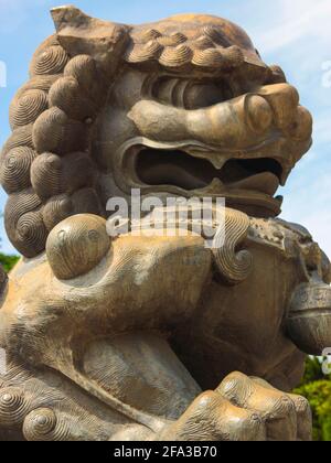 A classic, traditional stone carved mythical Chinese dragon statue. At the Zhishan Garden in Taipei, Taiwan. Stock Photo
