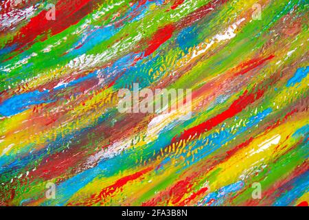 Background from different strokes of red, yellow, green and blue paint Stock Photo