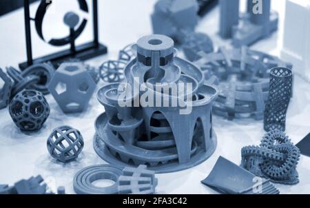 Models printed by 3d printer. Bright colorful objects printed on a 3d printer Stock Photo