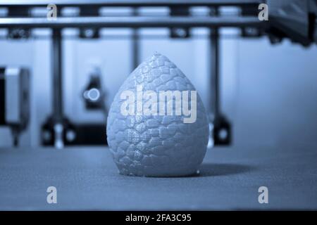 Model is printed on a 3d printer oval form. Blue gray color Stock Photo