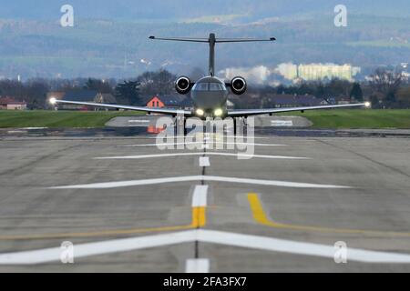 Mnichovo Hradiste, Czech Republic. 22nd Apr, 2021. Business airplane Pilatus PC-24 landing off on the Airport Mnichovo Hradiste in the Bohemian Paradise (70 kilometers north from Prague) during the COVID-19 pandemic in the Czech Republic. Credit: Slavek Ruta/ZUMA Wire/Alamy Live News Stock Photo