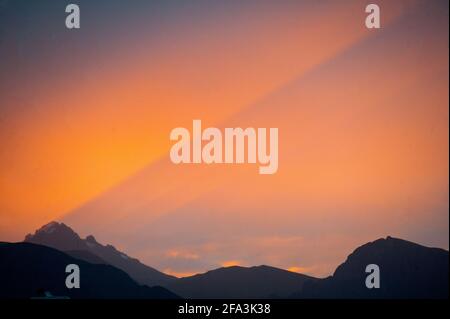 Quito, Ecuador. 22nd Apr, 2021. A view of a ray of light painted on the southern face of the active volcano Guagua Pichincha after a torrential rainfall. (Photo by Juan Diego Montenegro/SOPA Images/Sipa USA) Credit: Sipa USA/Alamy Live News Stock Photo