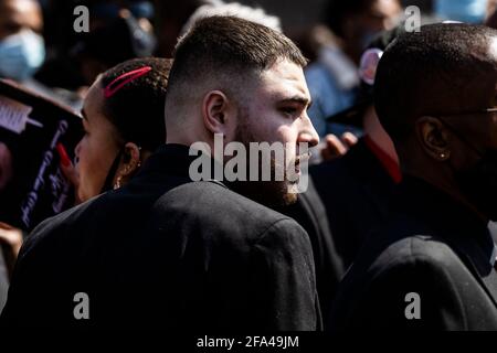 Minneapolis, Minn., USA. 22nd Apr, 2021. Dallas Wright, brother of Daunte Wright, following his funeral at Shiloh Temple International Ministries in Minneapolis, Minn., U.S., on Thursday, April 22, 2021. Wright was shot by police officer Kimberly Ann Potter who claims she thought she was deploying a taser when Wright attempted to flee as police attempted to place him under arrest for an outstanding warrant during a traffic stop. Credit: Samuel Corum/CNP | usage worldwide Credit: dpa/Alamy Live News Stock Photo