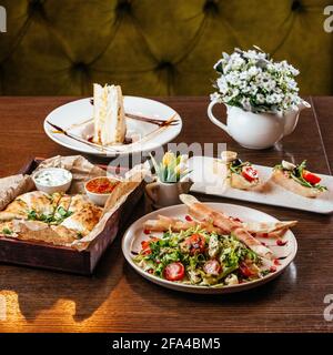 Italian food on dark background with pasta, pizza, top view, cop Stock Photo