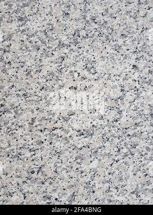 Vertical shot of a gray spotted stone texture - for background and texture Stock Photo