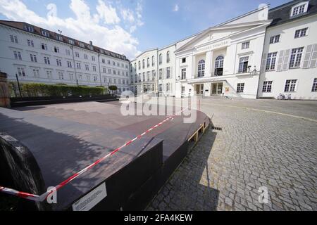 Berlin, Germany. 21st Apr, 2021. A grandstand is set up in front of the entrance to the Deutsches Theater. Those in charge of the Deutsches Theater are still hoping for an open-air season this year. (to dpa: Deutsches Theater hopes for open-air season) Credit: Jörg Carstensen/dpa/Alamy Live News Stock Photo