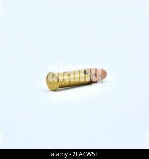 Isolated studio shot of a copper headed .22 bullet cartridge on a white background Stock Photo