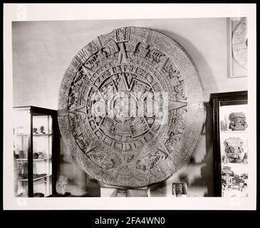 Cast of the Aztec calendar stone or Sun Stone and other Mexican antiquities in the Natural History Museum or National Museum of Natural History Stock Photo