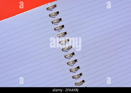 Spiral bound notebook, open with empty lined pages Stock Photo