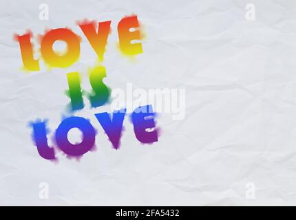 Phrase 'LOVE IS LOVE' with smudged or wet ink letters in rainbow colored LGBT pride flag colors on a white crumpled paper background. Copy space. Stock Photo