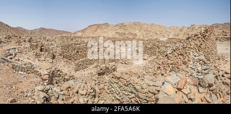 View across old abandoned ruins of Roman quarry town buildings at Mons Claudianus in Egyptian eastern desert Stock Photo