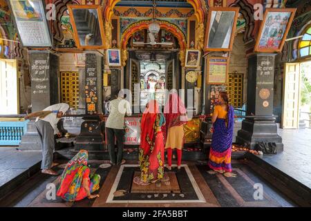 Ujjain, India - March 2021: People making offerings at the Gopal Temple in Ujjain on March 24, 2021 in Madhya Pradesh, India. Stock Photo