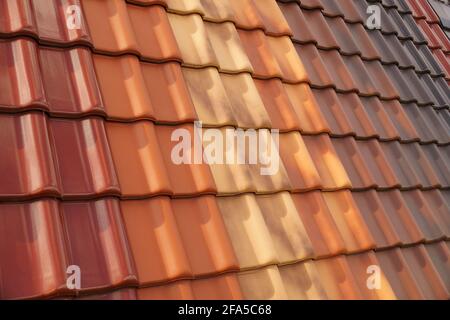 Very durable roof cover. A classic ceramic tiles in different shape and color. Stock Photo