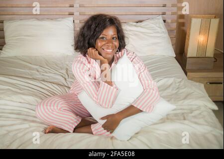 Beautiful Smiling Young Woman Pajamas Sitting Bed Stock Photo by