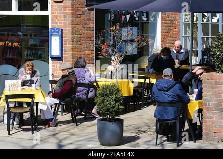 Tenterden, Kent, UK. 23rd Apr, 2021. UK Weather: Sunny in the town of Tenterden in Kent as people get out and enjoy the sunny weather now that some of the lockdown restrictions have been lifted. Busy outside cafe. Photo Credit: Paul Lawrenson /Alamy Live News Stock Photo