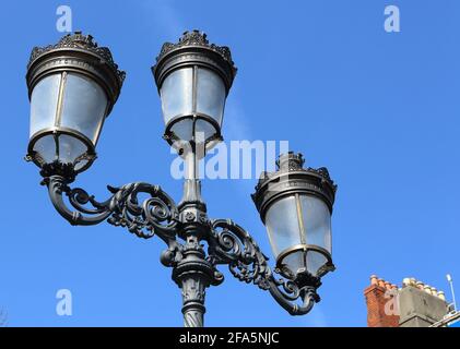 Street lamps on O'Connell bridge in Dublin, Ireland Stock Photo