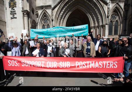 London, UK. 23rd Apr, 2021. Postmasters celebrate outside the High Court after their convictions were quashed., Judges have quashed the convictions of 39 former postmasters after the UK's most widespread miscarriage of justice. They were convicted of stealing money, with some imprisoned, after the Post Office installed the Horizon computer system in branches.The system was flawed and postmasters and postmistresses have spent years trying to clear their names. Judges said the Post Office sought to reverse the burden of proof when prosecuting the postmasters. Credit: Mark Thomas/Alamy Live News Stock Photo