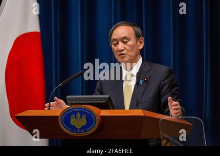 Tokyo, Japan. 23rd Apr, 2021. TOKYO, JAPAN - APRIL 23: Japan's Prime Minister Yoshihide Suga speaks during a press conference on April 23, 2021 in Tokyo, Japan. Suga has declared a state of emergency for Tokyo and the prefectures of Osaka, Kyoto and Hyogo that will begin on April 25th in an effort to curb a surge in Covid-19 coronavirus. However, with only three months to go until the Olympics, Japan has vaccinated less than one percent of its population in a program which is receiving widespread criticism for its slow pace. Credit: POOL/ZUMA Wire/Alamy Live News Stock Photo