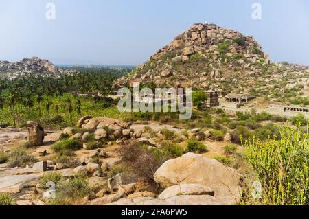 Hampi, Karnataka, India: Ruins of the 16th century Achyutaraya Temple at the foot Matanga hill (Veerabhadra Temple on top) Stock Photo